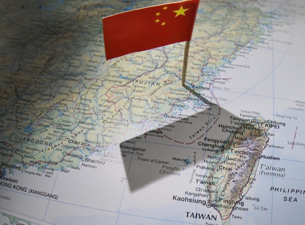 Chinese flag overshadowing Taiwan