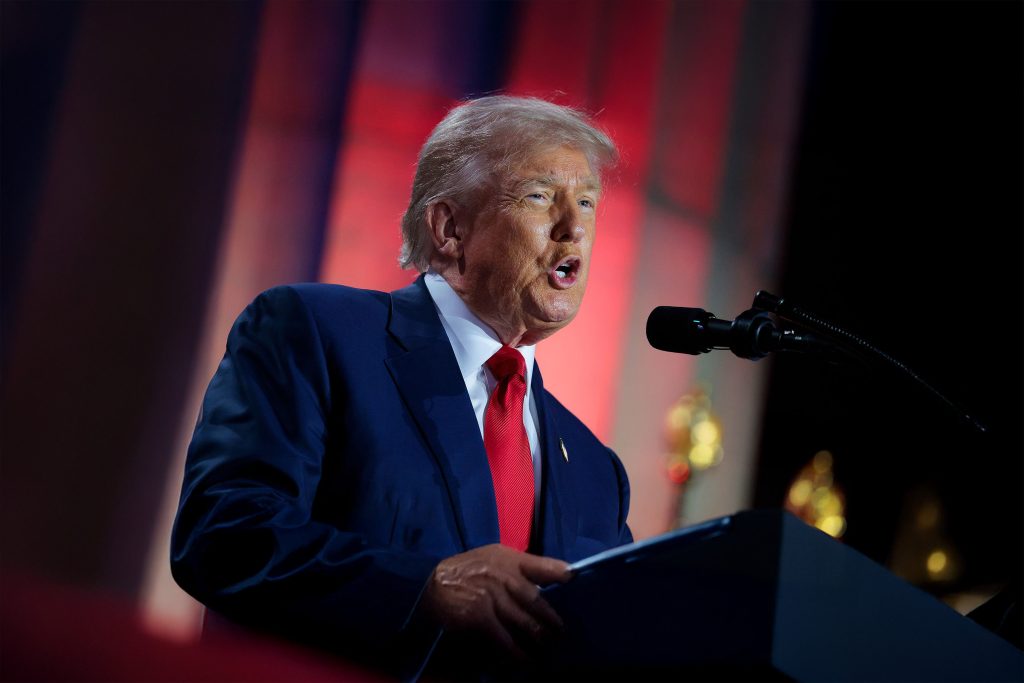 Donald Trump speaking at the “Winning the AI Race” Summit in Washington, DC, representing political focus on artificial intelligence and global technology risk.