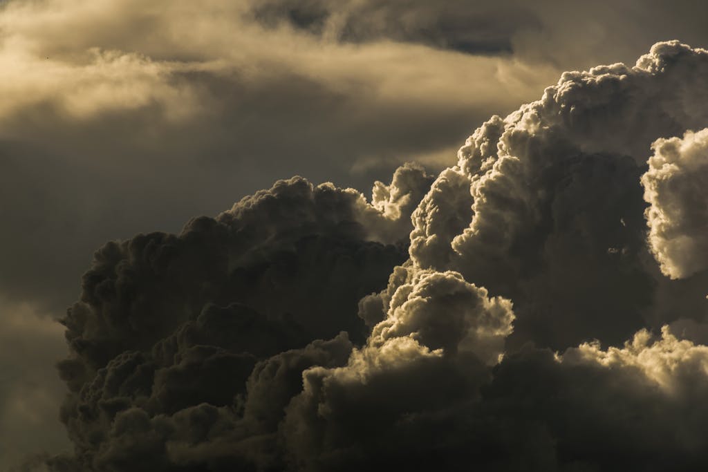 A powerful image of dark, dramatic clouds under a moody sky.